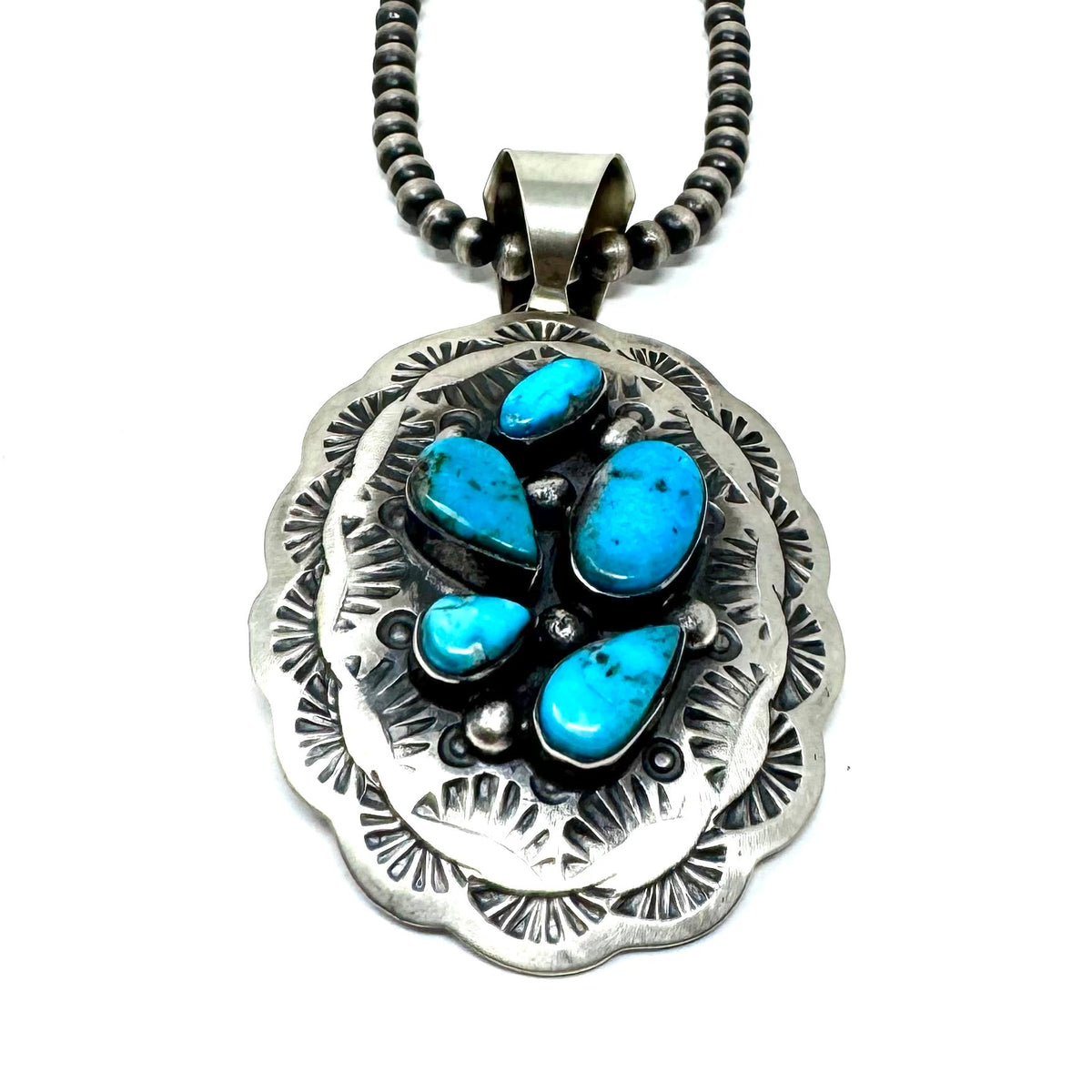 CB 44 TURQUOISE TEAR DROPS CHIMNEY BUTTE PENDANT – Blanca Flor 